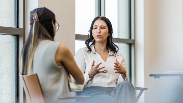 Two women talking to eachother